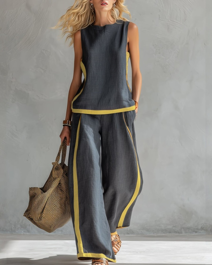 Women's elegant sleeveless top & wide leg trouser set for a chic, comfortable summer outfit.