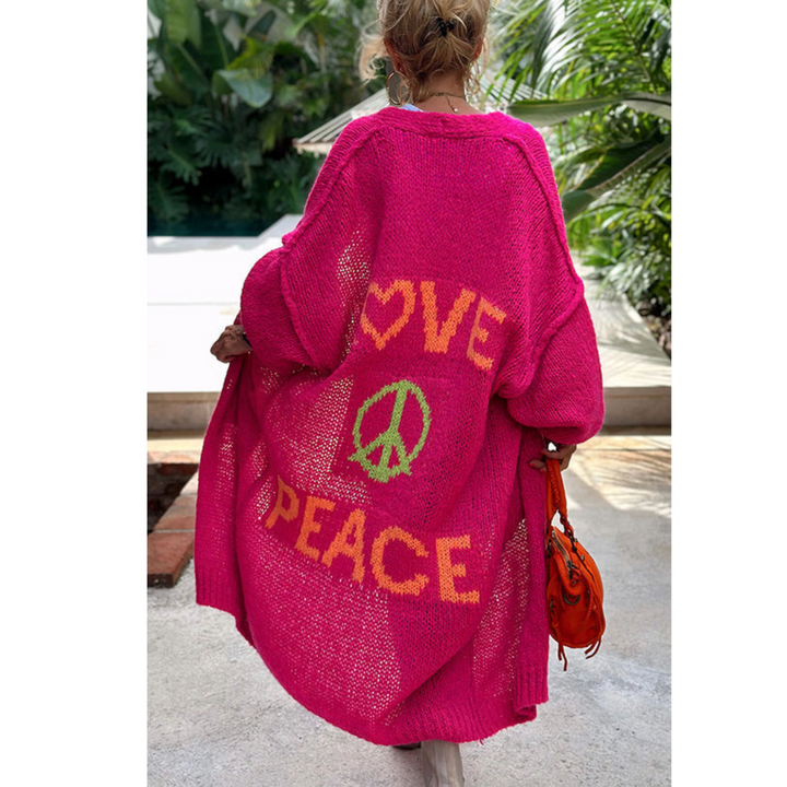 Cozy women's long sleeve peace cardigan. Hippie vibe, bohemian fashion, ideal for casual layering or festivals.