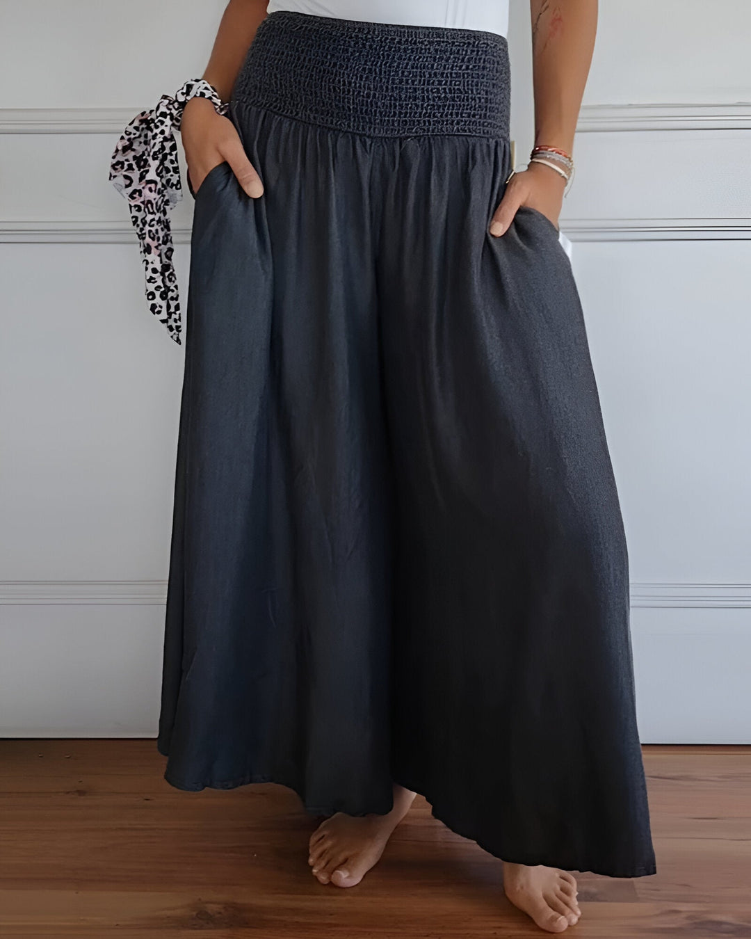 Elegant women's flowy maxi skirt. Smocked waist, side pockets, perfect for comfortable spring & summer outings.