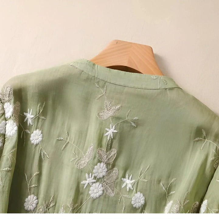 Relaxed fit women's top, exquisitely embroidered. Chic, versatile, and tummy skimming.