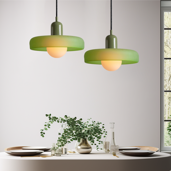Sleek Bauhaus pendant light, colored glass adds artistic touch to rooms.