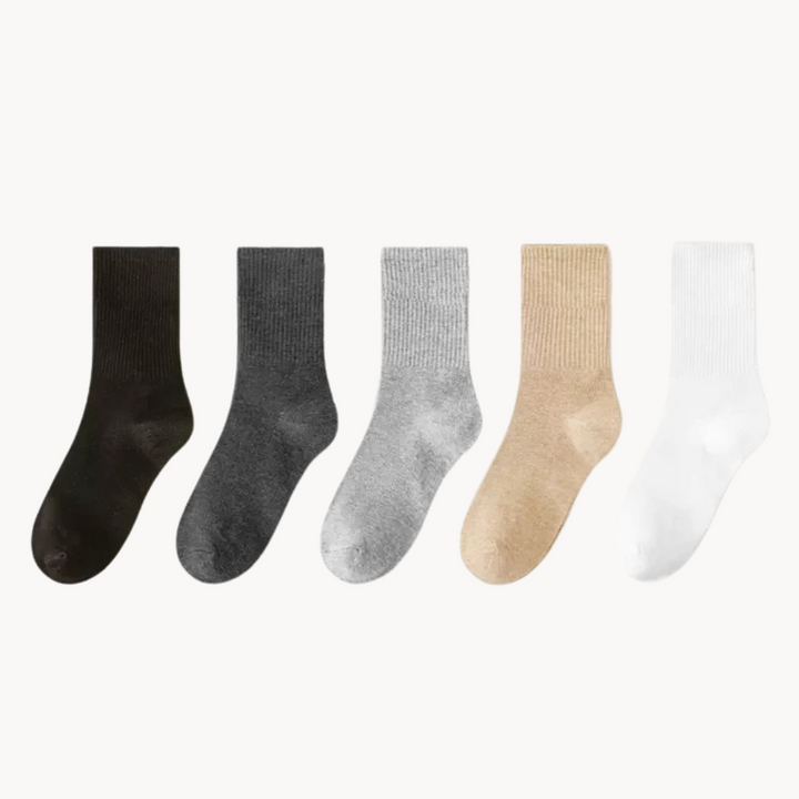 Performance unisex socks with cushioning & arch support, ideal for active comfort.