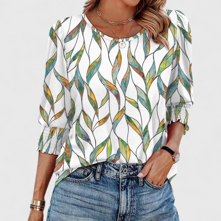 Soft, elegant women's smocked top, a comfortable and stylish ladies fashion choice.