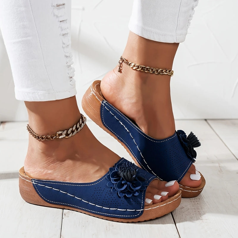 Textured women's orthopedic wedge sandals, providing stylish comfort, arch support, and durable wear.