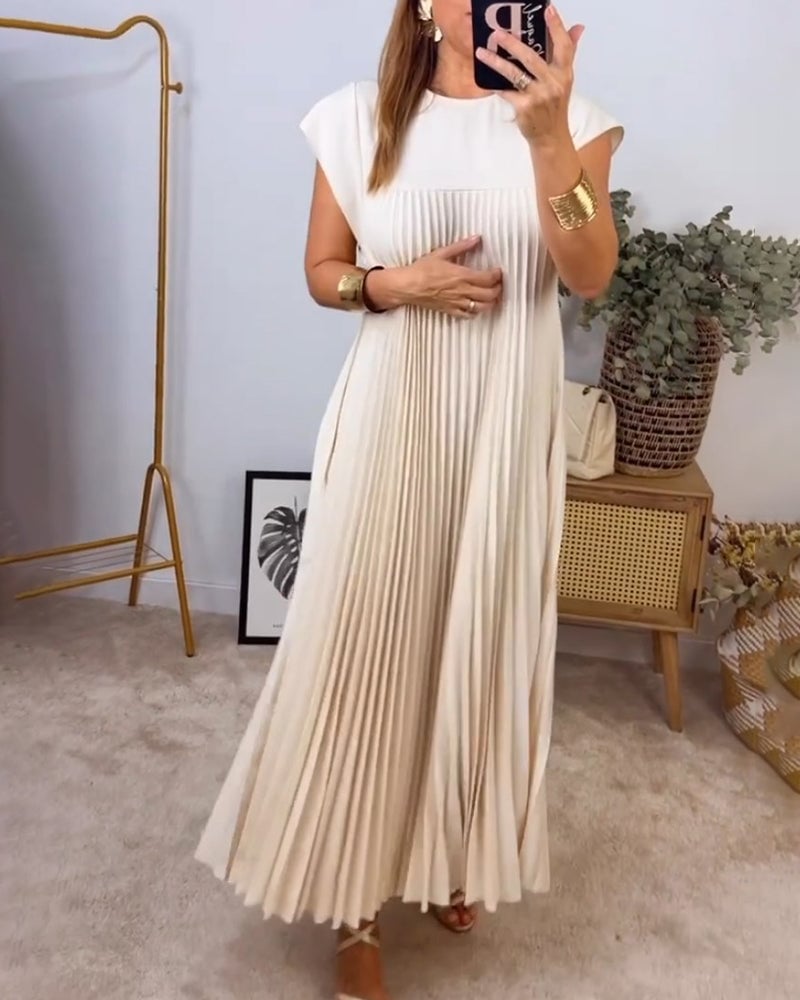 Timeless pleated women's dress offering comfort and chic elegance for any occasion.