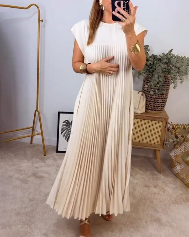 Timeless pleated women's dress offering comfort and chic elegance for any occasion.