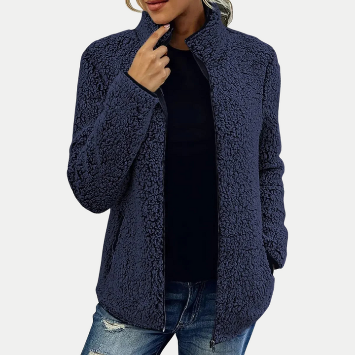Elegant women's zip-up textured fleece jacket, high collar, long sleeve. Perfect versatile outerwear for fashion & comfort.