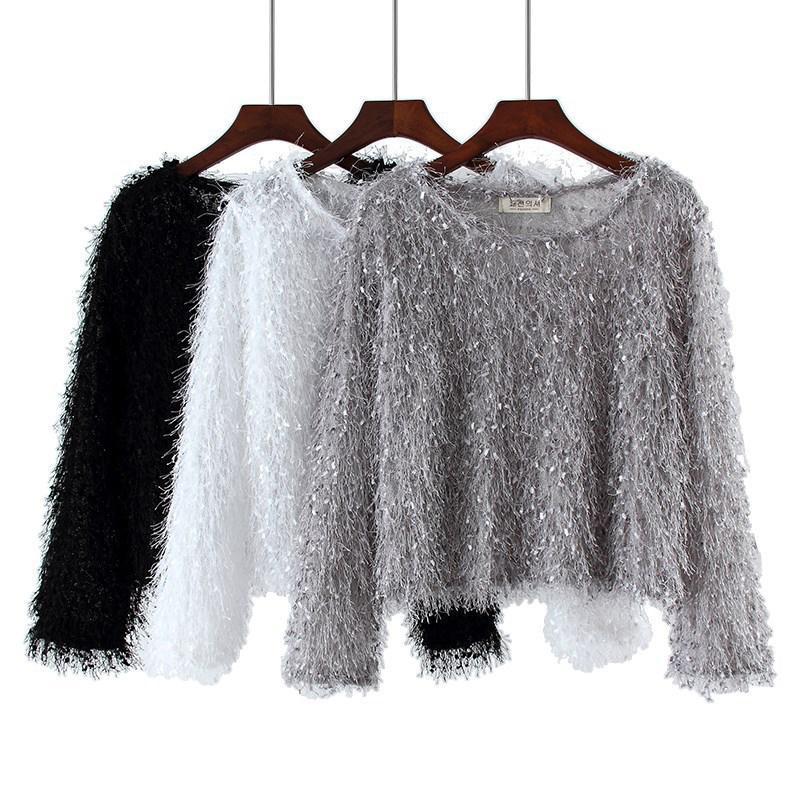 Solid color women's plush long sleeve sweater, offering a comfortable round neck fit for daily wear.