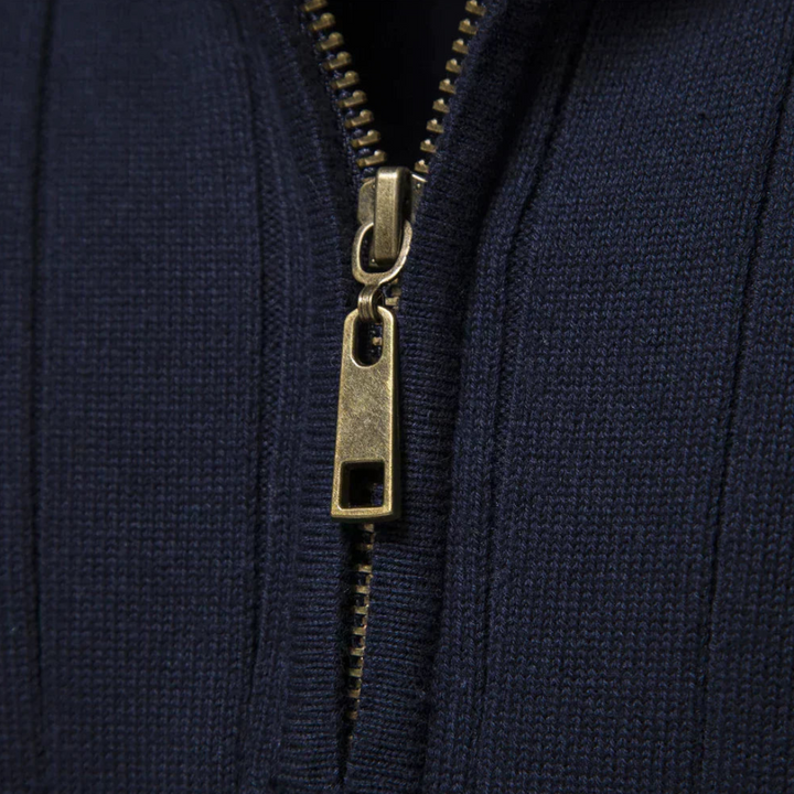 Soft, fitted men's quarter-zip sweater with long sleeves. Mock neck design for versatile casual wear.