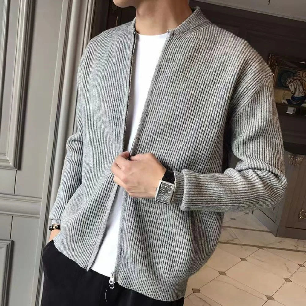 Warm men's cozy zipper cardigan, a stylish loose-fit sweater for casual all-season outerwear. Modern design.