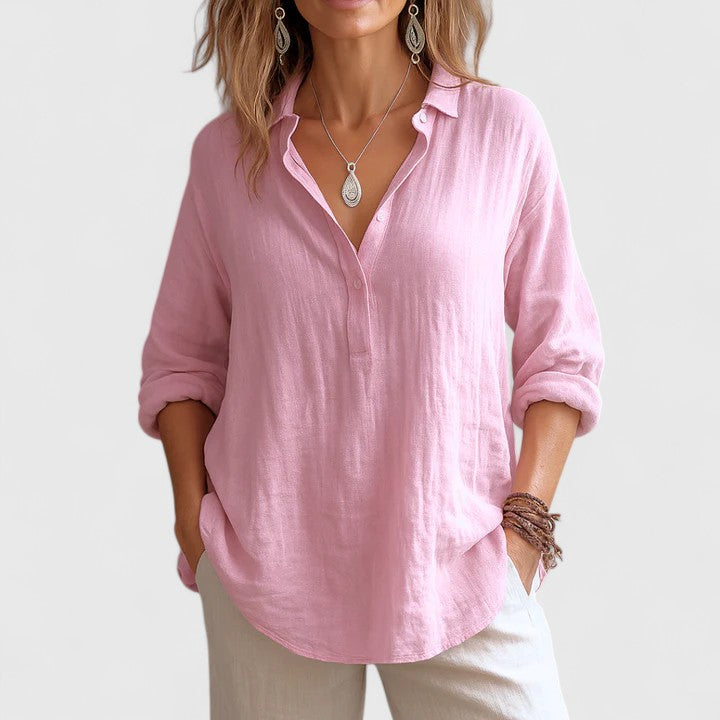 Women's comfortable flowy blouse with long sleeves & round neck, ideal for casual elegant summer style.