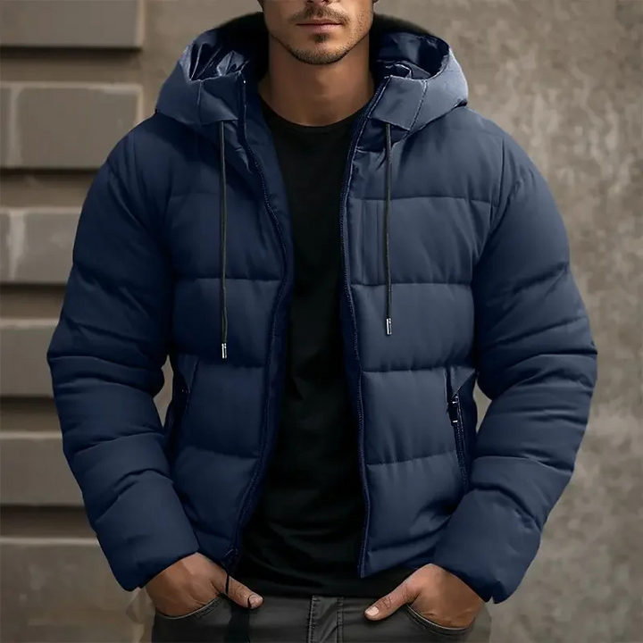 Quilted men's winter jacket with a hood, offering premium warmth & comfort.