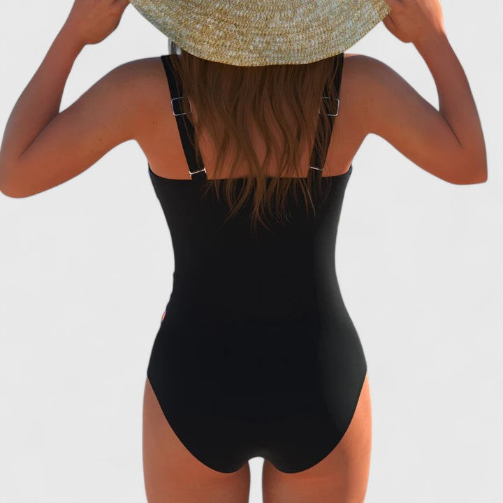 Contemporary women's printed one-piece swimsuit, excellent for beach style, resort wear, and pool party fun.