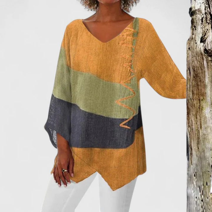 Artistic brushstroke print V-neck tunic top for women, featuring a relaxed asymmetrical fit, ideal for summer casual wear.