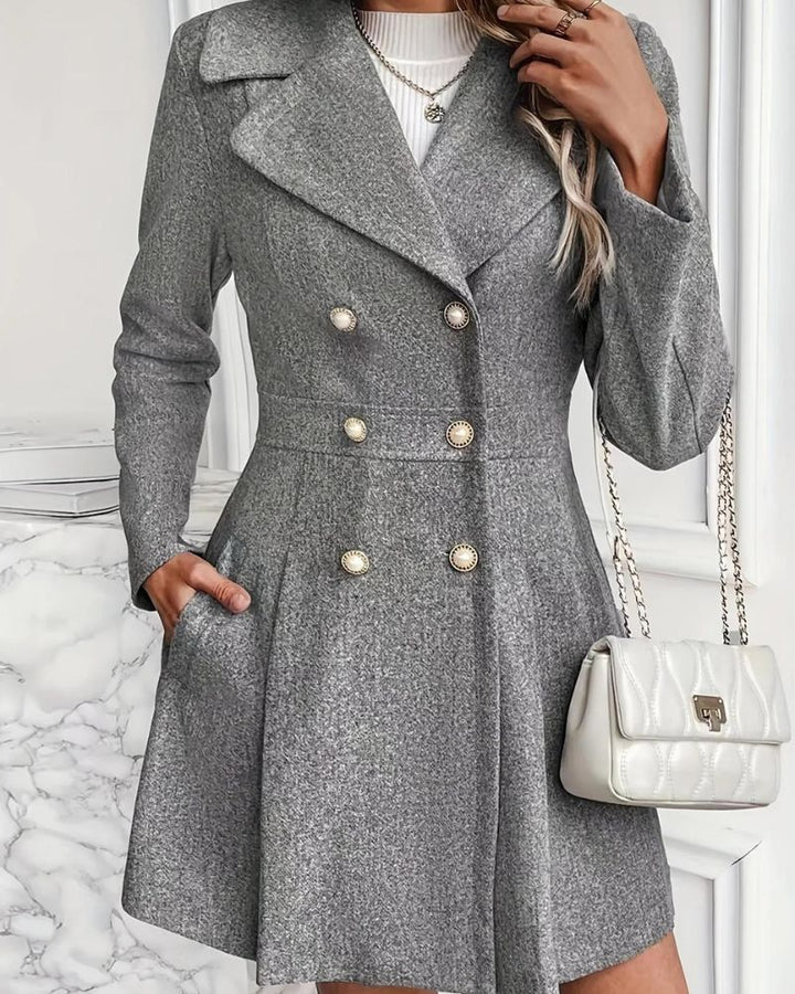 Stylish pleated longline winter coat for women, ideal for elegant fall & winter outerwear.