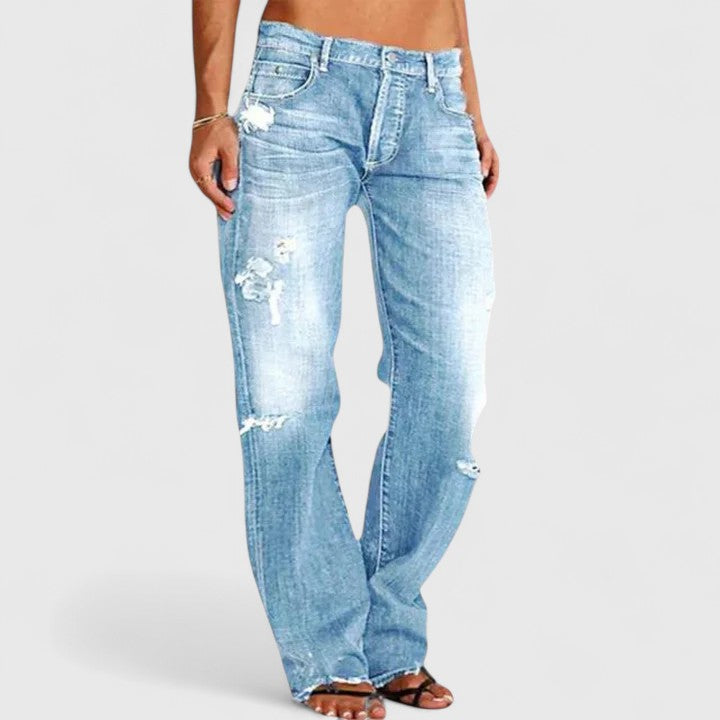 Grey wide-leg jeans for women. Effortlessly elegant and casual, these relaxed fit pants offer modern, versatile style.