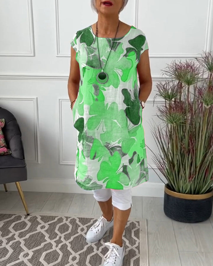 Effortless women's casual floral dress, relaxed fit, ideal for everyday spring/summer style.