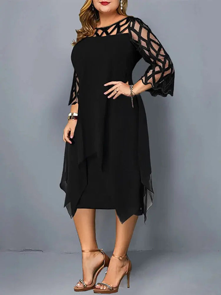 Chic black plus size midi dress for women, ideal for evening or formal wear. Elegant and flattering silhouette.