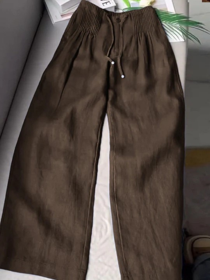 Chic women's flowy wide leg trousers, offering effortless style & comfort for any casual occasion.