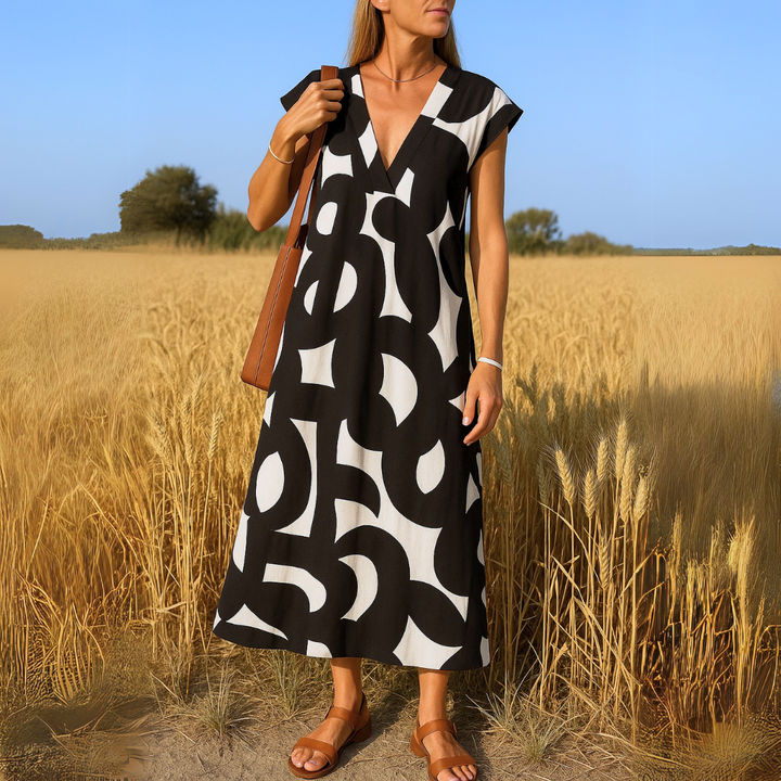 Women's lightweight V-neck dress, effortless style & comfort. Ideal casual summer dress with a flowy design.