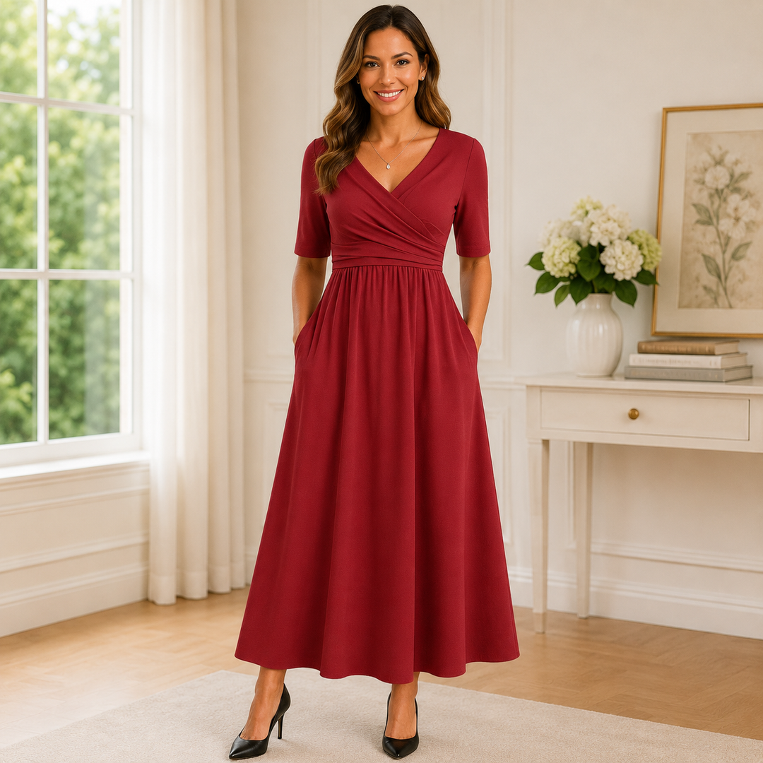 Women's comfortable loungewear babydoll dress with short sleeves, V-neck, midi length, and convenient pockets.