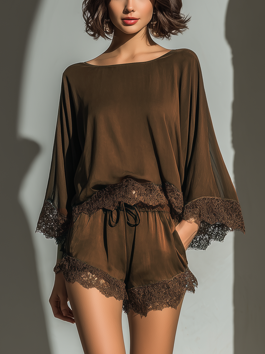 Black loungewear shorts for women, featuring a comfortable drawstring waist, ideal for relaxing at home.