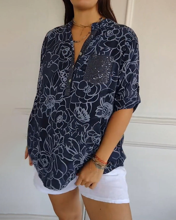 Elegant floral print women's blouse, a versatile long sleeve top with a relaxed fit.