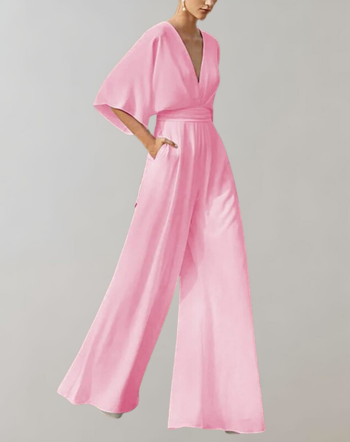 Women's wide leg overall jumpsuit featuring a relaxed fit, adjustable straps, great for summer fashion.