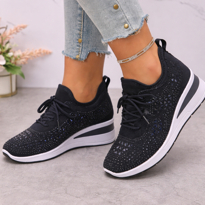 Comfortable women's walking sneakers with advanced arch support for daily wear.