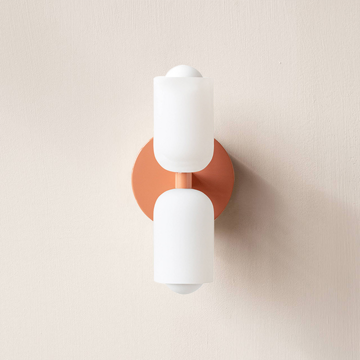Slim profile modern wall lamp, uplight downlight, offering subtle yet impactful ambient lighting.