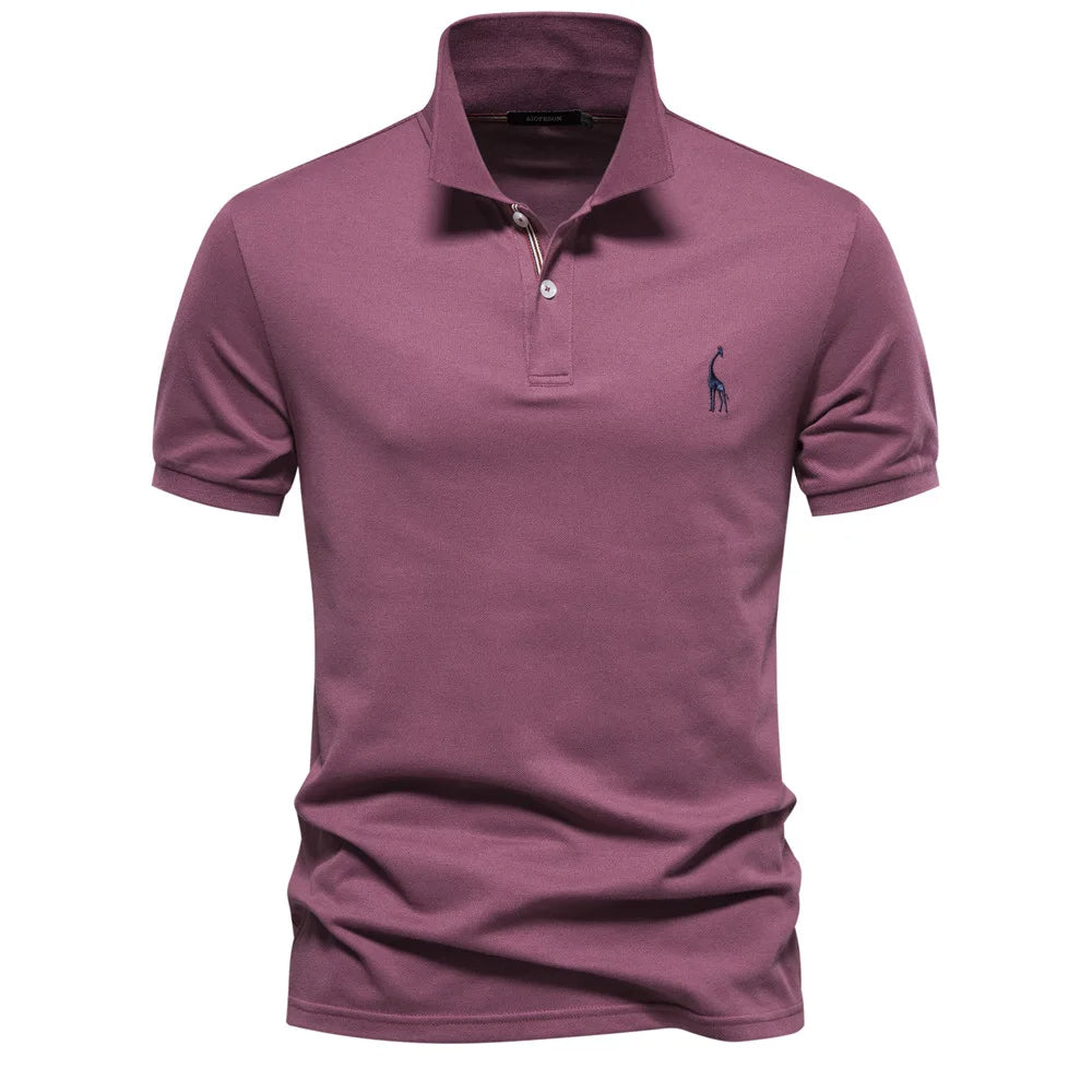 Sophisticated men's fashion polo, short sleeve, featuring a meticulously crafted deer embroidery.