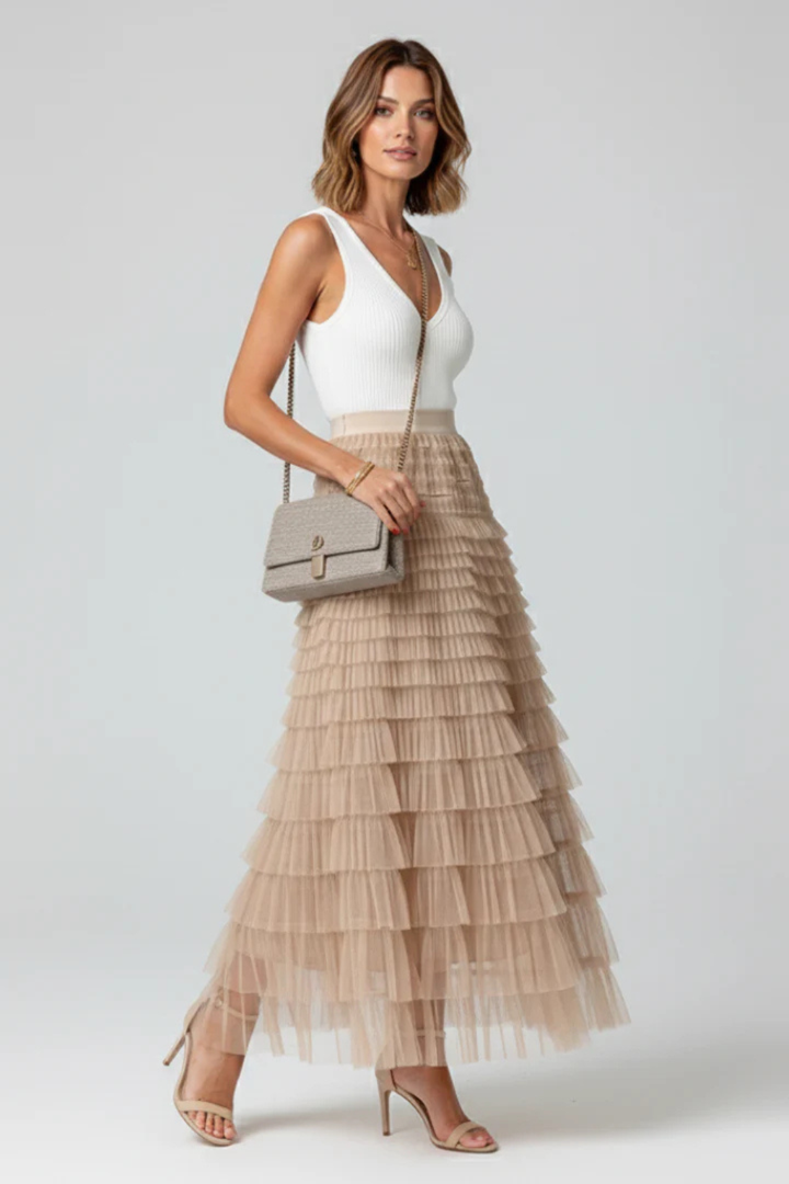 Elegant women's tiered midi skirt with a graceful layered design, ideal for evening wear or casual chic.