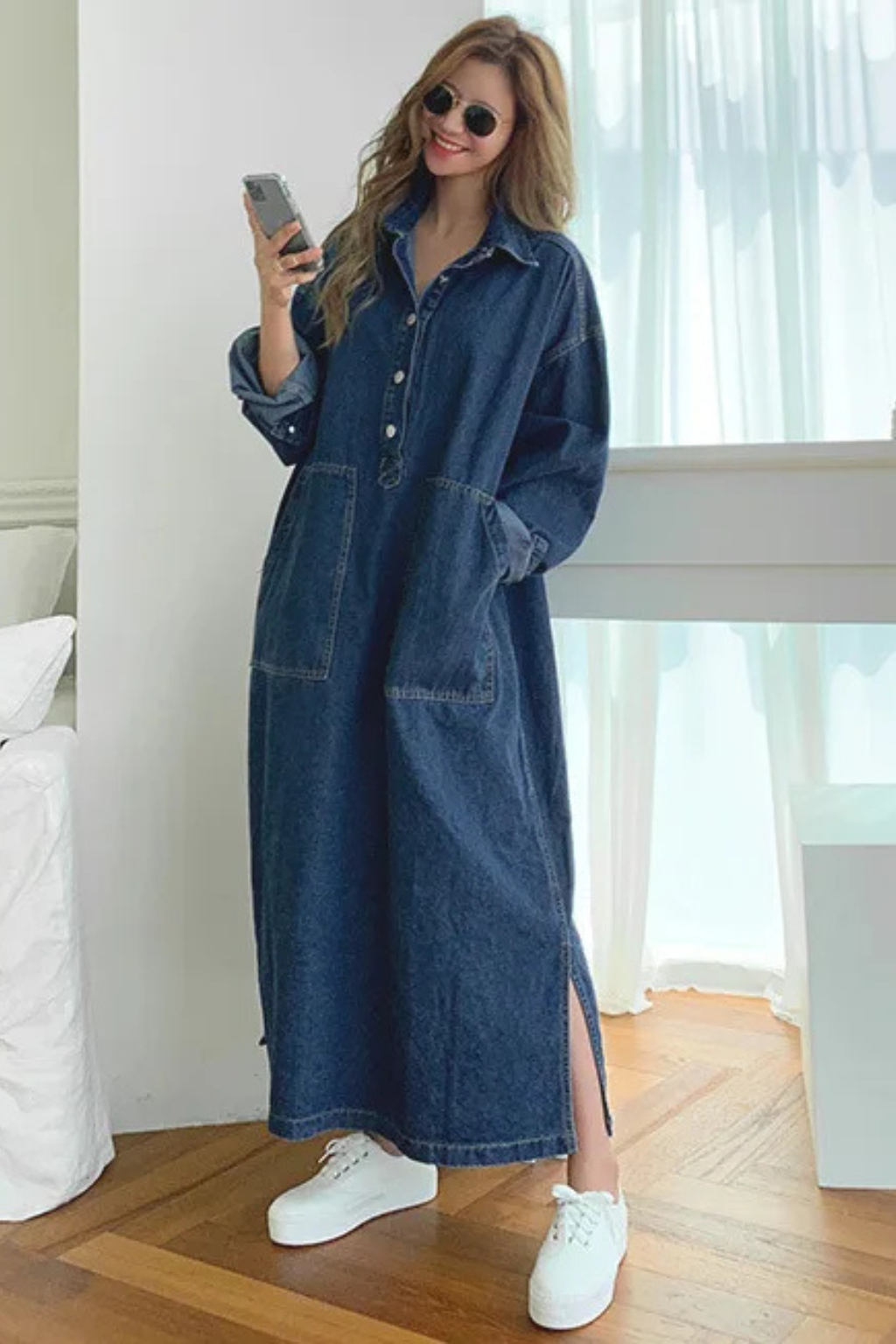 Elegant oversized maxi dress for women, with long sleeves, a collared neckline, and side pockets for casual comfort.