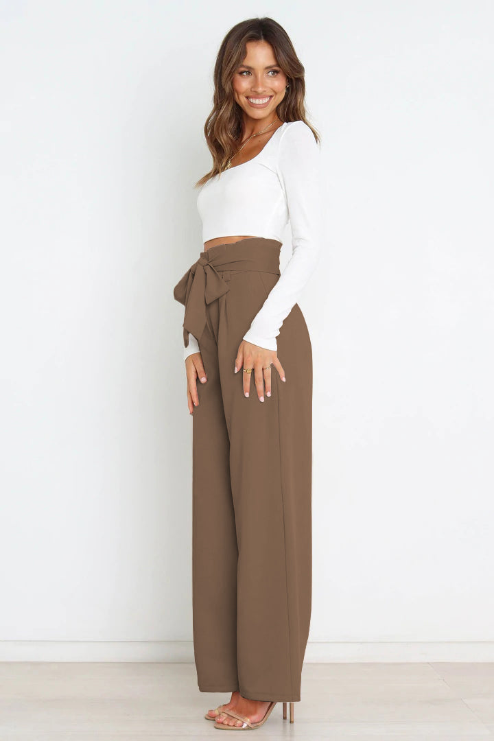 Comfortable women's wide leg paperbag pants, high waist & a stylish bow accent.
