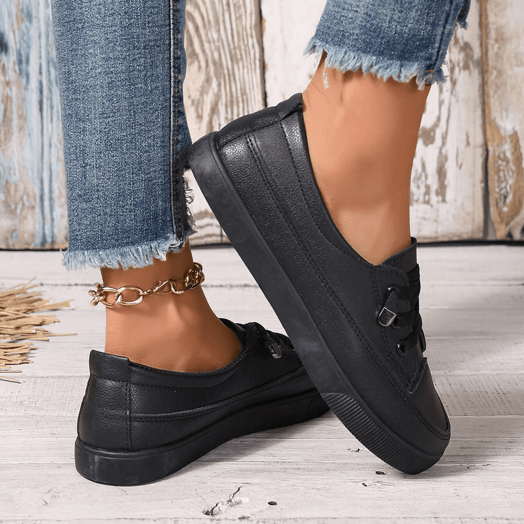 Stylish white women's casual sneakers with orthopaedic comfort & foot pain relief.