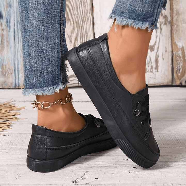 Stylish white women's casual sneakers with orthopaedic comfort & foot pain relief.