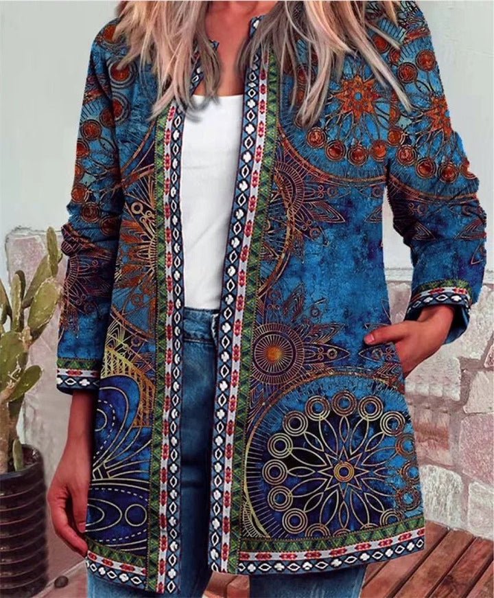 Eye-catching bohemian outerwear: a women's vibrant jacket with a unique, colorful pattern for a fashion-forward look.