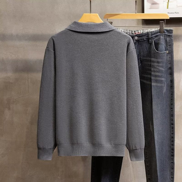 Relaxed fit men's polo sweater with intricate ribbed knit, ideal for comfortable and smart casual autumn wear.