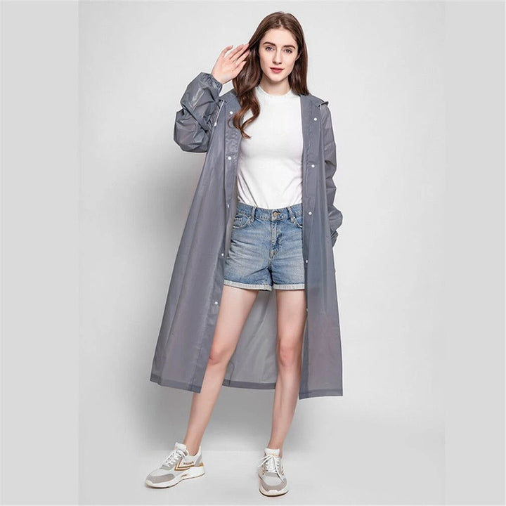 Women's lightweight packable raincoat, ideal travel gear for all-weather protection & casual outdoor wear.