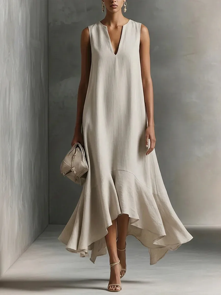 Effortless V-neck sleeveless maxi dress for women, flowing style with a graceful ruffled hem.