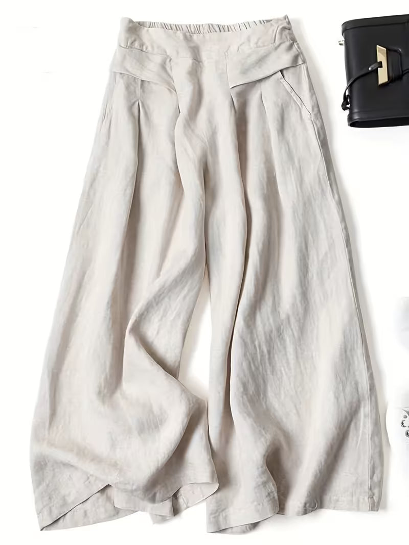 Versatile women's loose wide-leg pants, breathable fabric ensuring effortless comfort for any casual occasion.