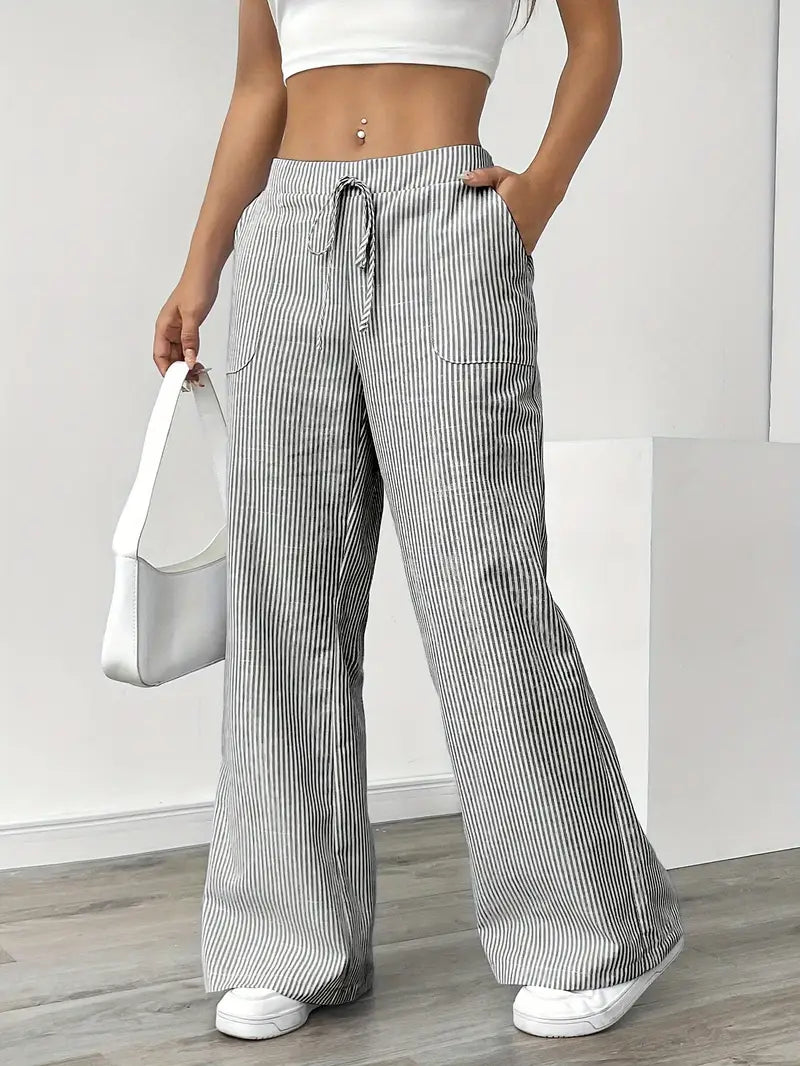 Elegant women's wide leg pants, black & white stripes, versatile for many looks.