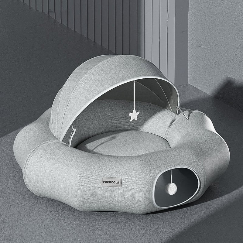 Versatile pet bed for cats & small dogs, offering a cozy den with a removable roof & attached toy. Perfect for rest.