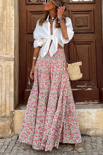 Summer-ready women's boho maxi skirt featuring a beautiful print & flowy design. Perfect for casual elegance.