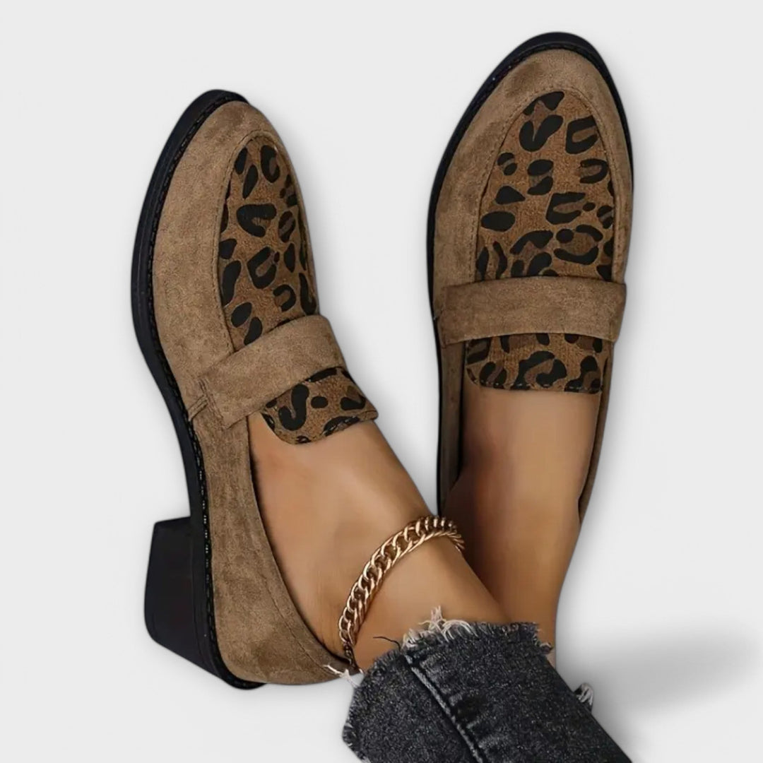 Elegant women's leopard print loafers, perfect for adding a stylish touch to any casual or semi-formal outfit.
