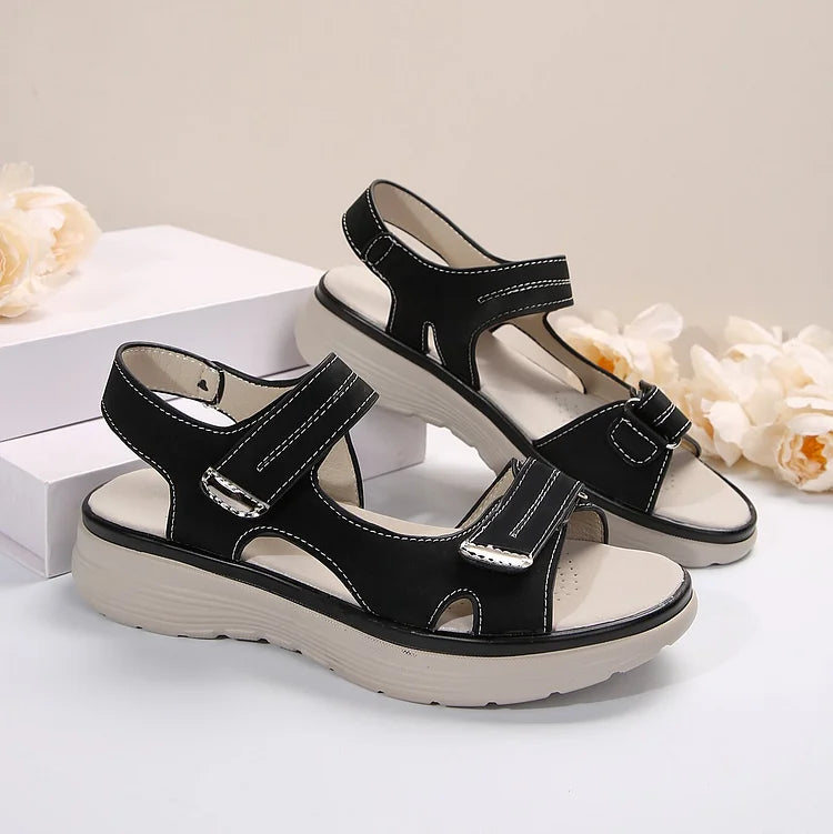 Ergonomic women's orthopaedic sandals, adjustable straps provide support & comfort for daily wear.