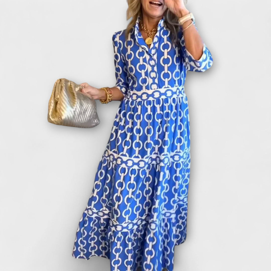 Women's elegant chain print midi dress with a collar and button front. Versatile for casual or formal wear.