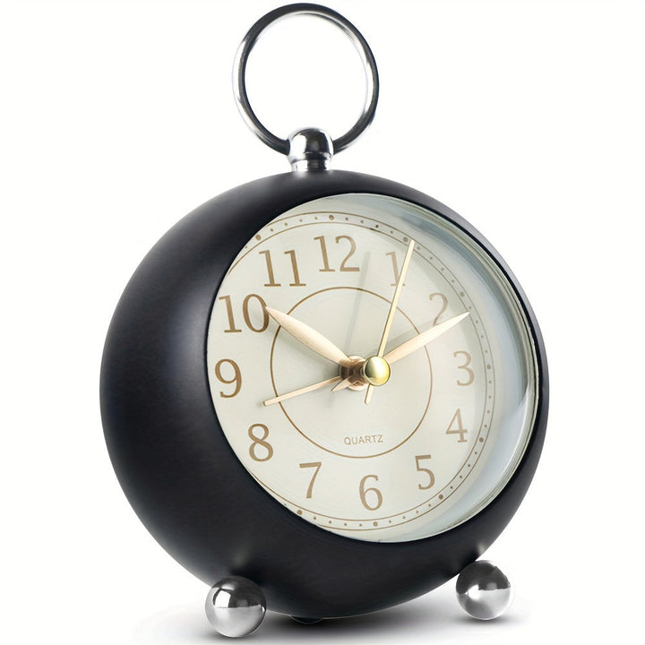 Battery operated vintage alarm clock in cyan with night light & quiet sweep. Great for home decor.