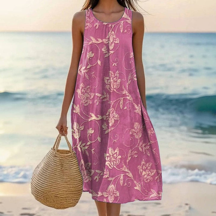 Women's floral midi dress, sleeveless, with a flowy fit, perfect for elegant everyday summer wear.