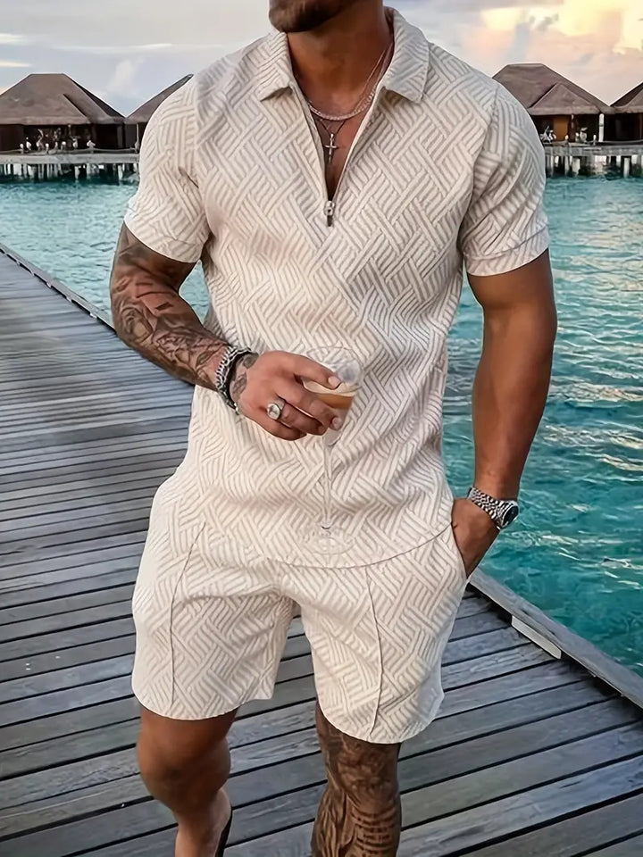 Trendy men's geometric print two-piece summer set. Polo and shorts for a casual, stylish menswear look.